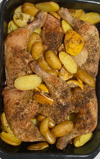 Baked Chicken, Potatoes & Garlic In Fried Lemon, Olive Oil, Oregano & White Wine Sauce